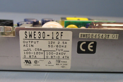 Toko SWE3012F Output: 12V 2.5A Power Supply ACin: 50/60Hz Used