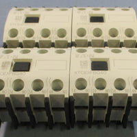 (Lot of 4) Eaton XTCEXFBG40 Auxiliary Contact 600VAC 15A Max, 250VDC 1A Max