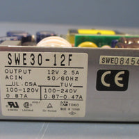 Toko SWE30-12F Output: 12V 2.5A Power Supply ACin: 50/60Hz Used